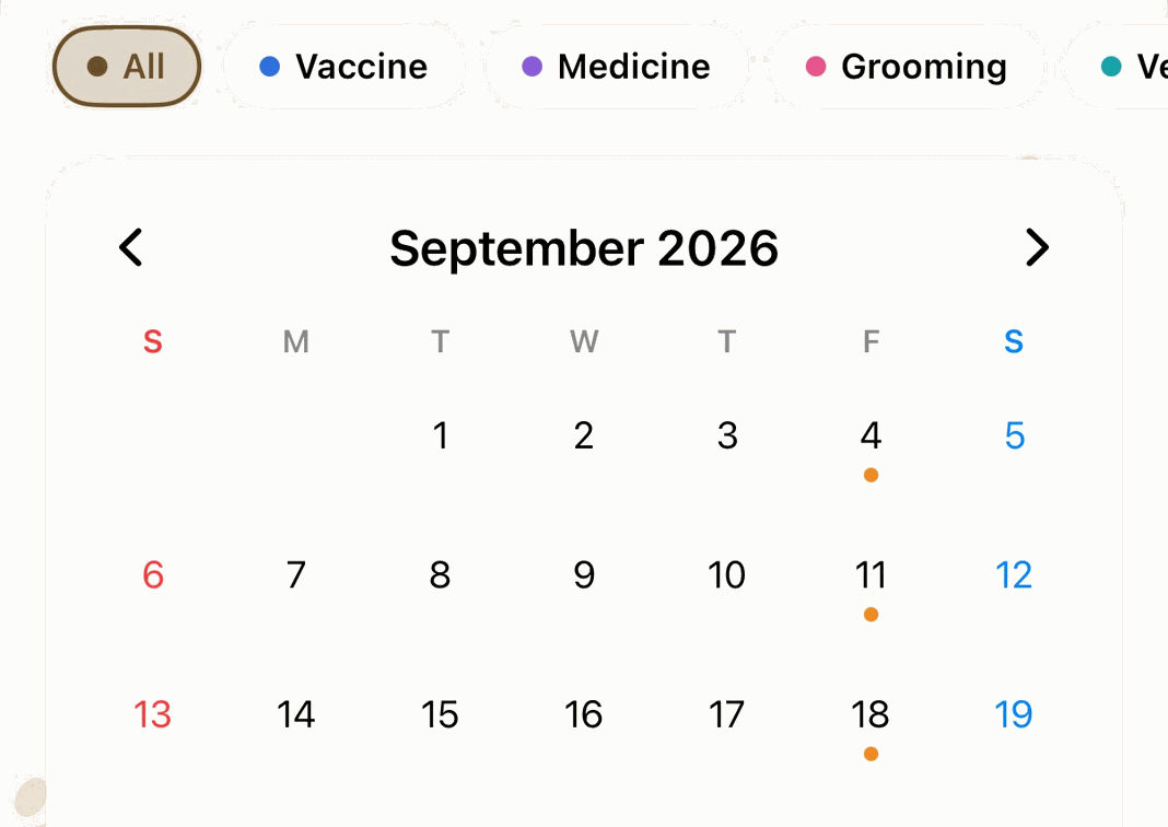 Calendar screen for September with care plans such as vaccines, medicine and grooming marked as colored dots